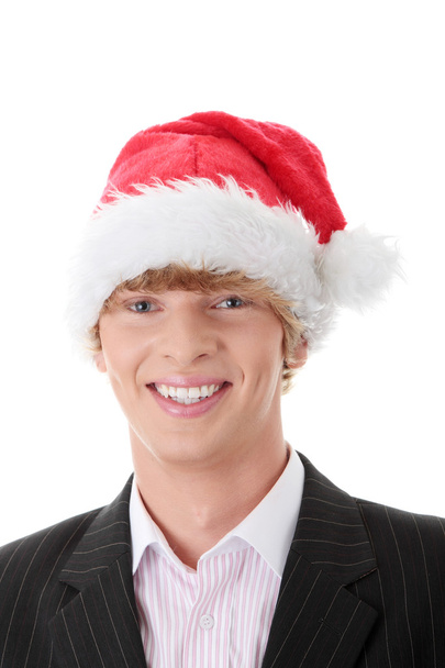 Businessman with santa cap - Фото, изображение