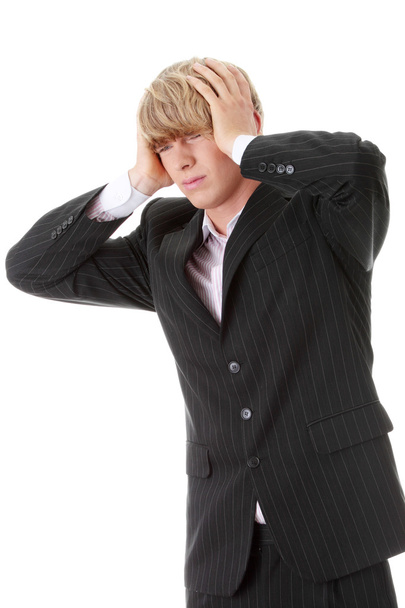 Businessman with a big headache - Фото, изображение