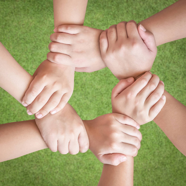 Circle of friend's unity , kid's friendship concept with isolated children's hands bonding in circle - Photo, Image