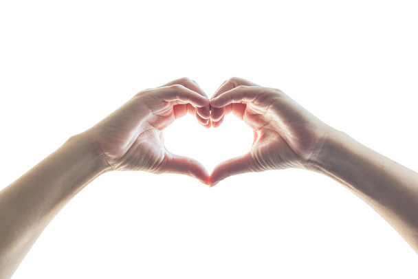 Mulheres isoladas mãos em forma de coração no fundo branco - Foto, Imagem