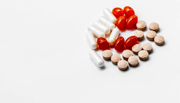 pills of different colors and composition - Фото, изображение