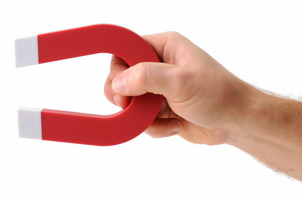 Hand holding magnet - Photo, Image