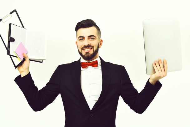 Smiling employer in classic black suit and red bow tie - Photo, Image