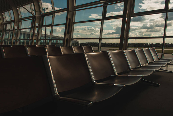 Rows of chairs in waiting hall of airport in Copenhagen, Denmark  - 写真・画像