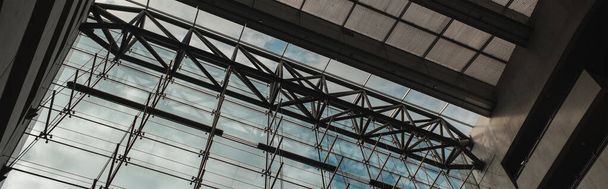COPENHAGEN, DENMARK - APRIL 30, 2020: Horizontal image of glass facade and roof in Black Diamond Royal Library, Copenhagen, Denmark  - Zdjęcie, obraz