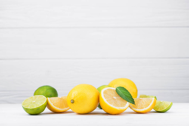 citrus fresh lemon fruit on white wood table - Zdjęcie, obraz