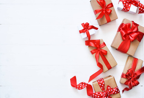 Beautiful composition of gifts with ribbons on a white background. Boxes with presents. Top view. - Φωτογραφία, εικόνα