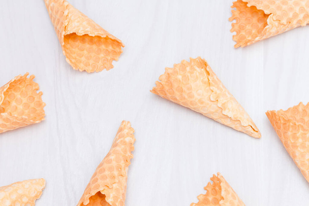 Waffle ice cream homemade cones pattern. Sweet, summer concept. Flat lay. - Foto, afbeelding