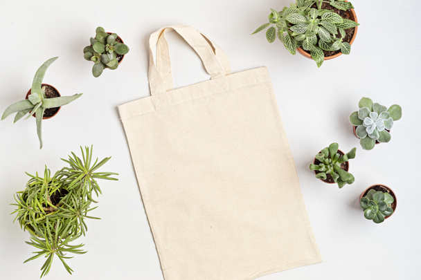 Cotton tote bag mockup. Zero waste living, sustainability, eco friendly lifestyle. Top view, flat lay - Photo, Image