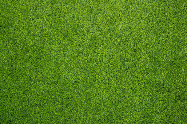 Вид зверху на текстуру зеленої трави
. - Фото, зображення