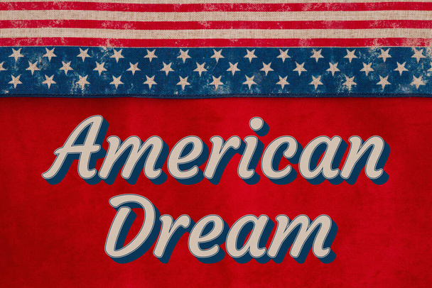 American Dream type message with retro USA stars and stripes burlap ribbon on red fabric with stars - Foto, afbeelding
