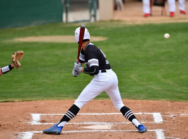 Baseball Player in action during a baseball game - Photo, Image