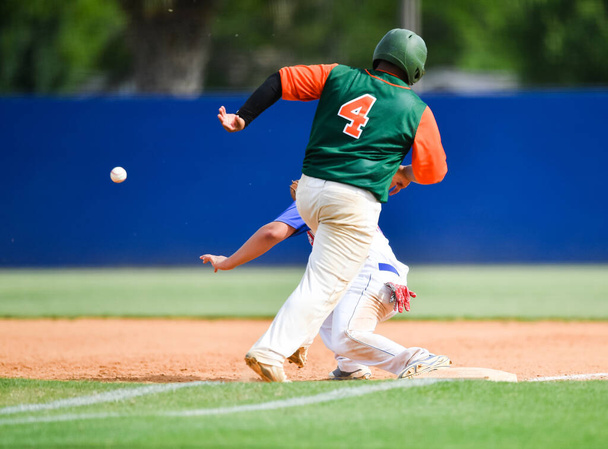 Baseball Player in action during a baseball game - Foto, Bild