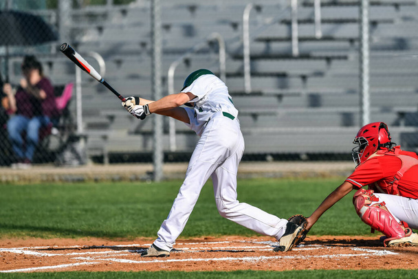 Baseball játékos akció közben egy baseball játék - Fotó, kép