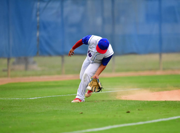 Baseball Player in action during a baseball game - Фото, зображення