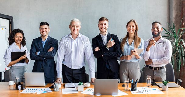 Smiling Coworkers Posing Standing Near Table In Modern Office, Panorama - Photo, Image