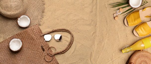 Composition with beach accessories on sand with space for text - Фото, зображення