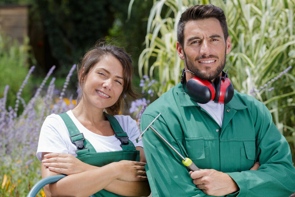 portrait of a young gardening couple - Zdjęcie, obraz