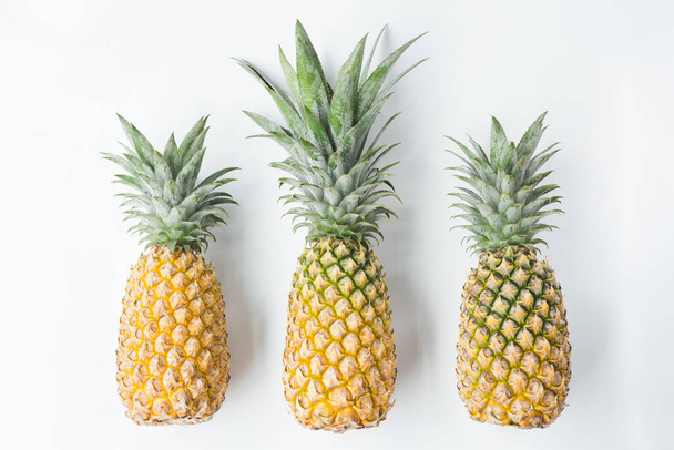 Fresh pineapples on the white background - Zdjęcie, obraz