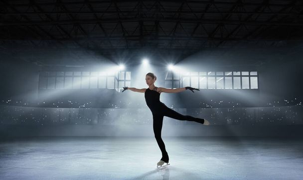 Figure skating girl in ice arena. - Photo, Image