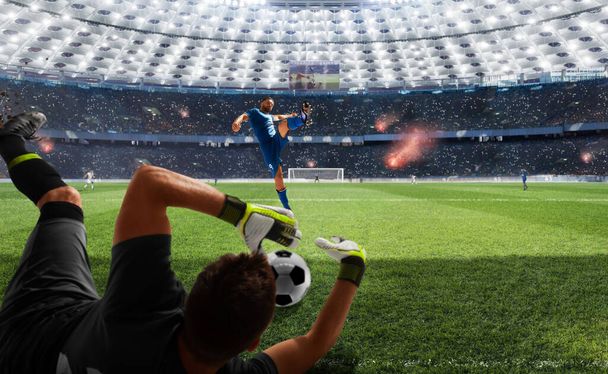 Soccer players in action on professional stadium. - Photo, Image