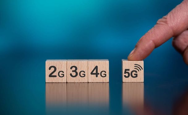 Concept of 5G with icons on wooden cubes - Foto, immagini