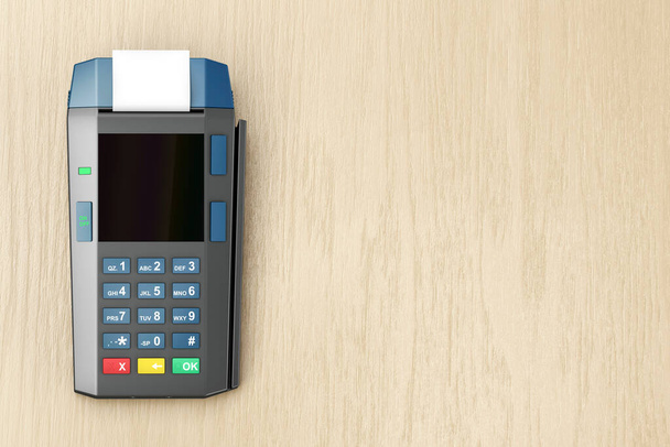 Терминал кредитной карты на деревянном столе, вид сверху
 - Фото, изображение