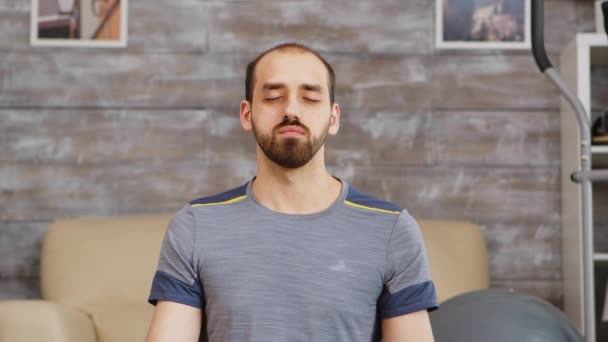 Guy doing breathing exercise - Кадри, відео
