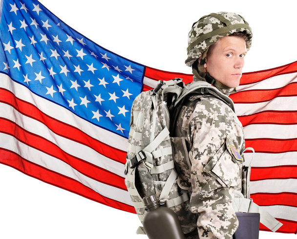 Male soldier and American flag on white background. Military service - Φωτογραφία, εικόνα