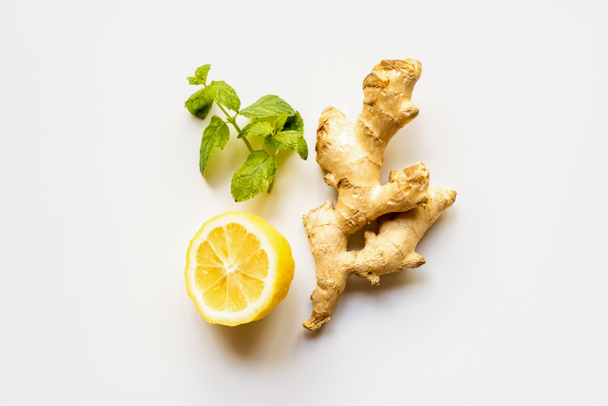 top view of ginger root, lemon and mint on white background - Photo, Image