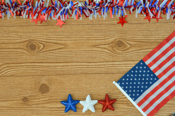 Celebrating Independence Day July 4th, President's Day, Memorial Day, Labor Day, Veteran's Day, Great America. United states flag on a wooden background with blue, white and red stars. - Foto, Imagen
