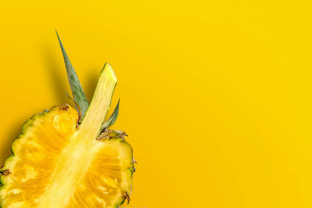 pineapple on yellow paper background - Φωτογραφία, εικόνα