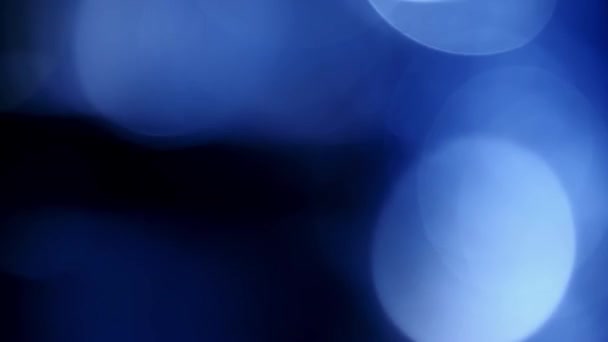 Переміщення синіх блискучих вогнів, деактивоване світло відбиття циклічного фону боке
 - Кадри, відео