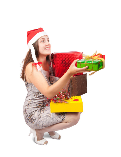 Nice girl holding coloured festive boxes - Foto, afbeelding