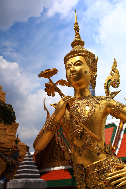 Golden statue of a Kinnara - Foto, immagini