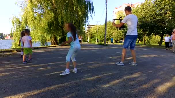 IVANO-FRANKIVSK, UKRAINE - JULY 23: Color running on a distance of 300 meters. Participants are painted with multi-colored paints on July 23, 2016 in Ivano-Frankivsk. - Filmati, video