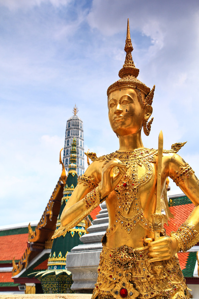 Golden statue of a Kinnara - 写真・画像