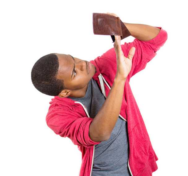 Человек смотрит в пустой бумажник
 - Фото, изображение
