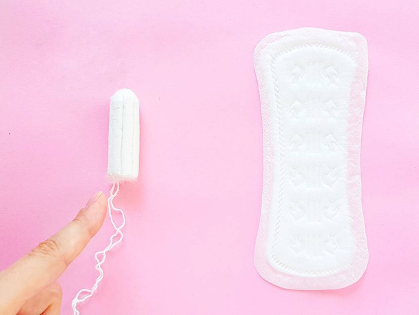 Intimate feminine hygiene products. The daily tampon and sanitary pads. Menstrual cycle. - Foto, Imagen