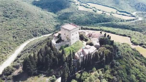 Ripa Orcia Castle, Orcia Valley, Tuscany. Circular aerial view at sunset - Footage, Video