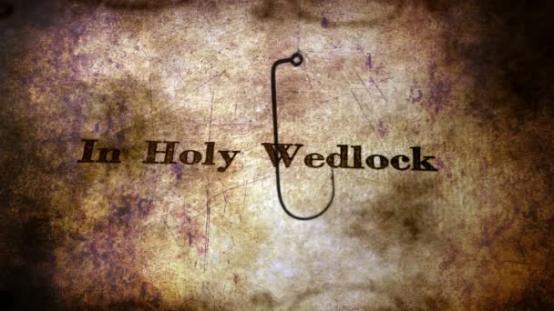 Fish hook against holy wedlock  bait concept - Footage, Video