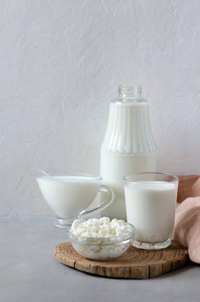 Homemade fermented beverage in a glass - kefir, cottage cheese, on a white background. Sour milk drink, yeast for yeast bacterial fermentation, intestinal health concept. Fashionable food and drinks - Φωτογραφία, εικόνα
