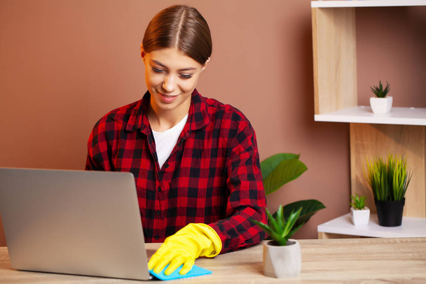 An employee of the cleaning company fulfills orders for office cleaning - Photo, Image