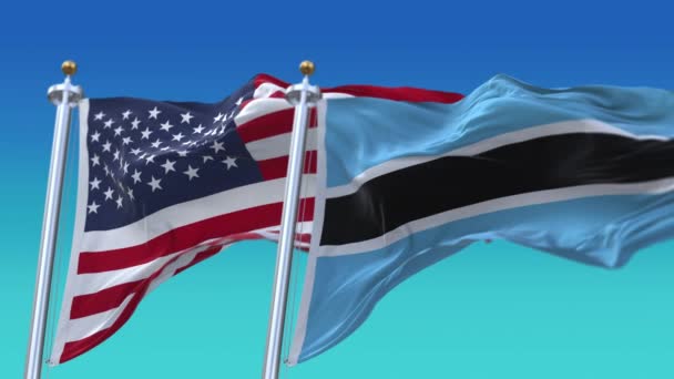 4k Stany Zjednoczone Ameryki Usa i Botswana Flaga narodowa płynne tło. - Materiał filmowy, wideo