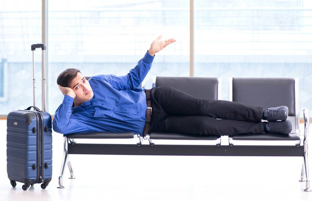 Man wairing to boarding in airport lounge room - Zdjęcie, obraz