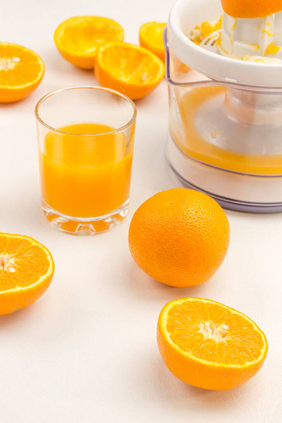 Orange juice, Oranges  for Healthy Diet Snack. White background. Top view.  - Foto, afbeelding