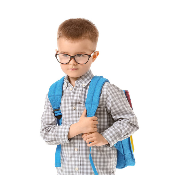 Cute little schoolboy on white background - Foto, imagen