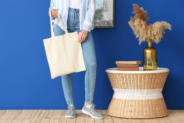 Young woman with eco bag at home - Foto, Imagem