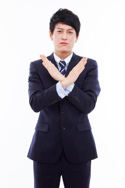 Young Asian man showing prohibit sign - Photo, Image