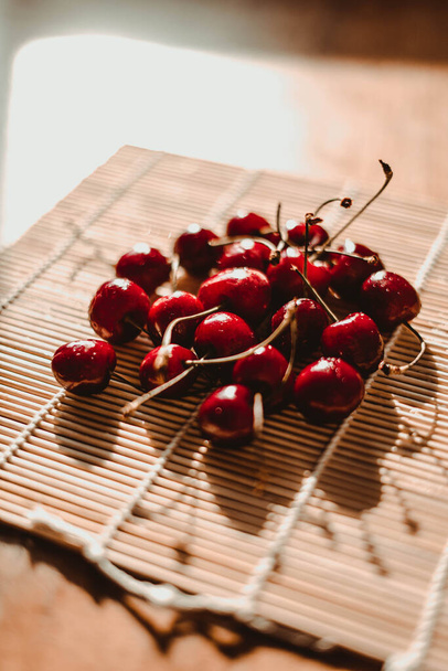 Delicious cherry on a hot sunny day - Foto, imagen